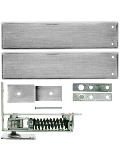 Standard Duty Swinging Door Floor Hinge With Plated-Steel Cover Plates in Satin Chrome.